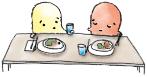 Två figurer sitter vid ett middagsbord